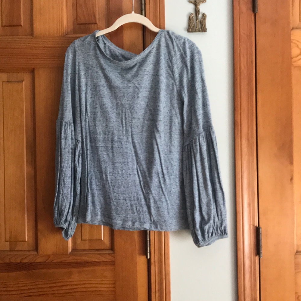 Long sleeve blue top.